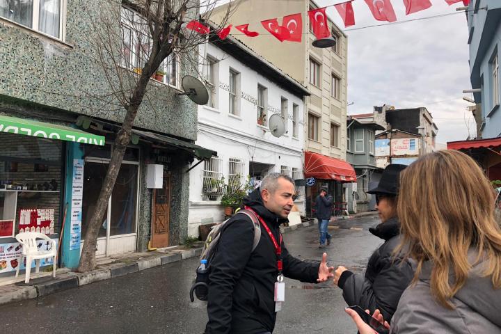 a man and a woman walking down a street