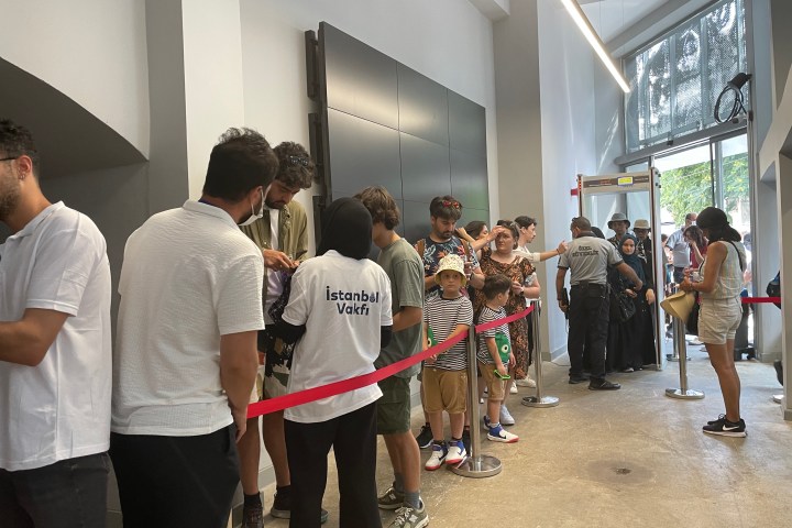 a group of people standing in a room