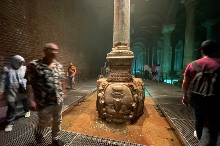 a man standing in front of a building