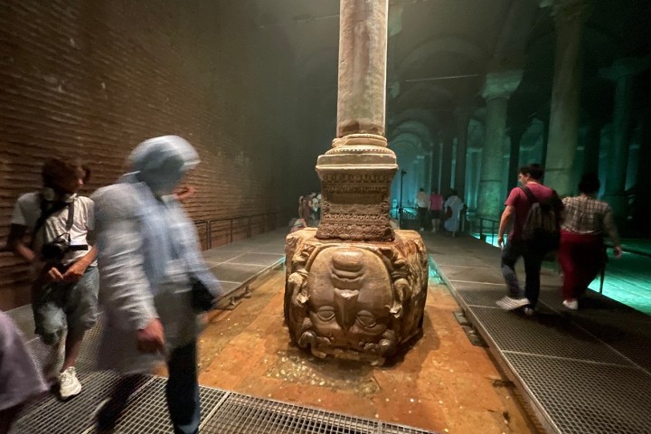 a group of people standing in front of a building