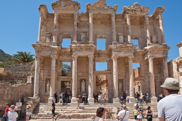a group of people standing in front of a building