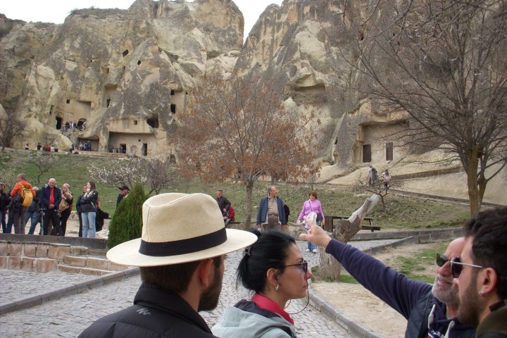 a group of people standing in front of a building