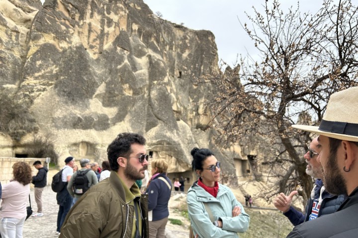 a group of people standing in front of a crowd